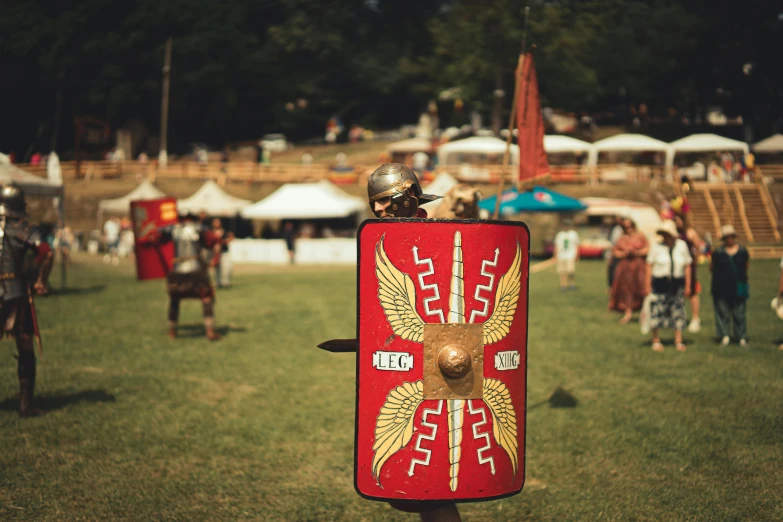 an old man with a shield and armor