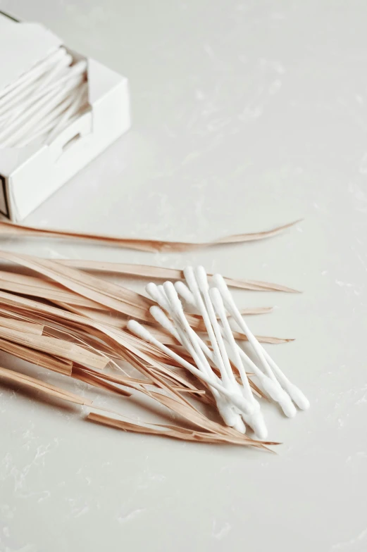 a group of sticks sitting on top of a table