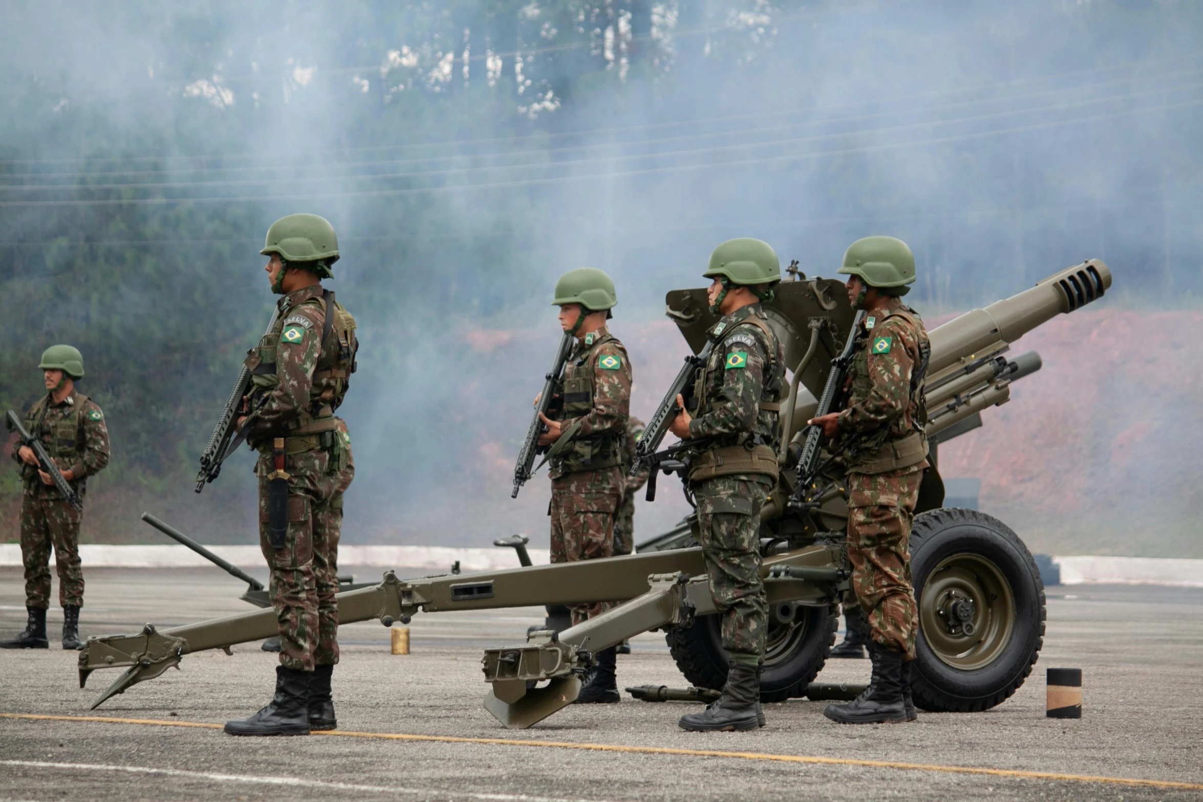 there are three men standing with military equipment