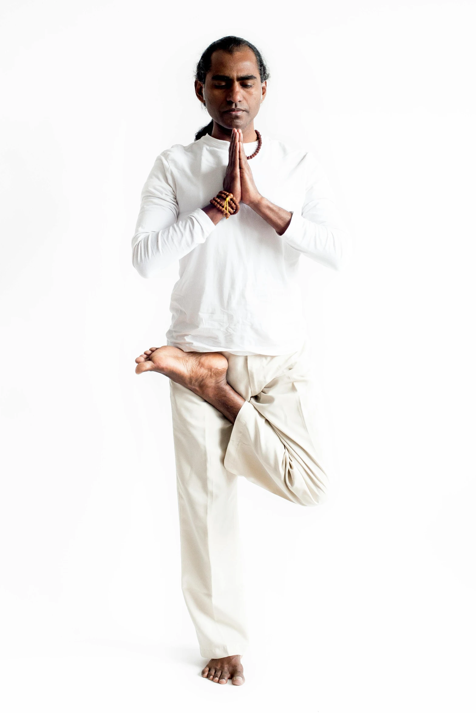 a man doing a karate pose on his hands