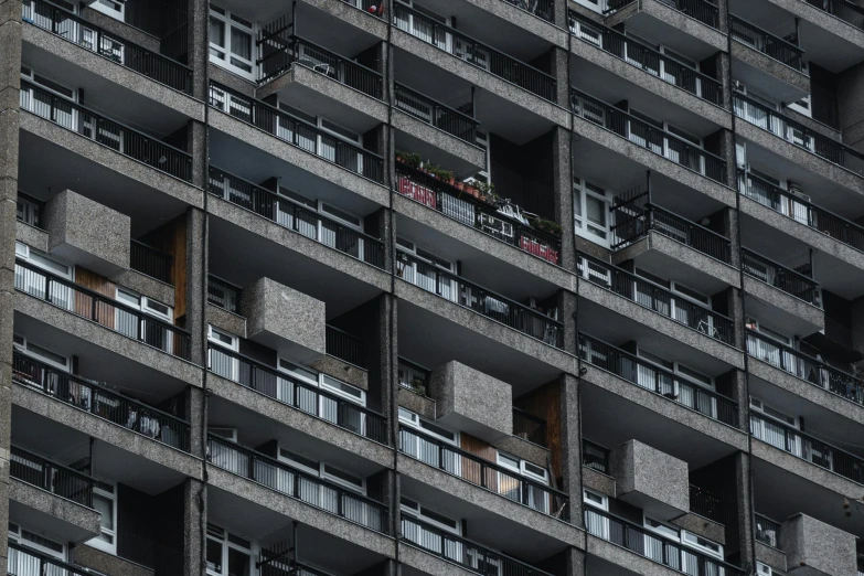 a very tall building with lots of balconies