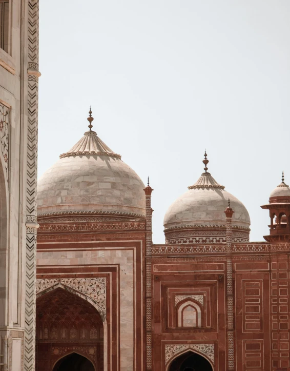 an ornate building with some domed tops