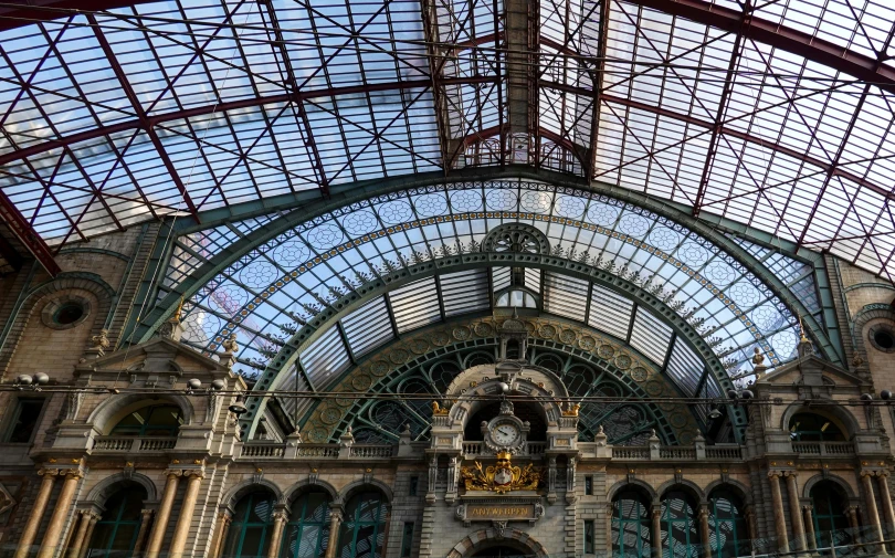 the inside of a station with a clock