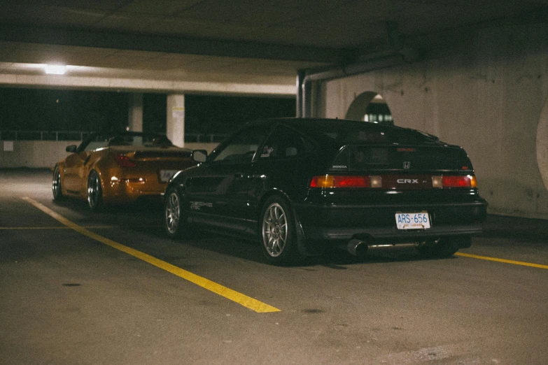 an suv parked in an underground parking garage with no one around