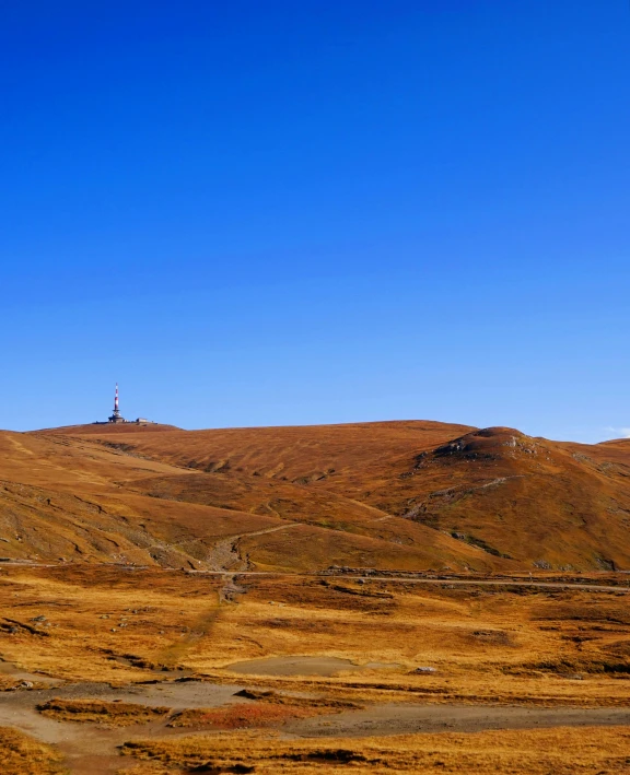 a view of a mountain with rocks and dirt