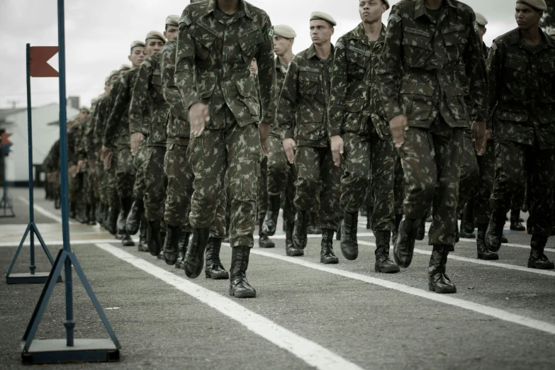 the army is going in formation for the parade