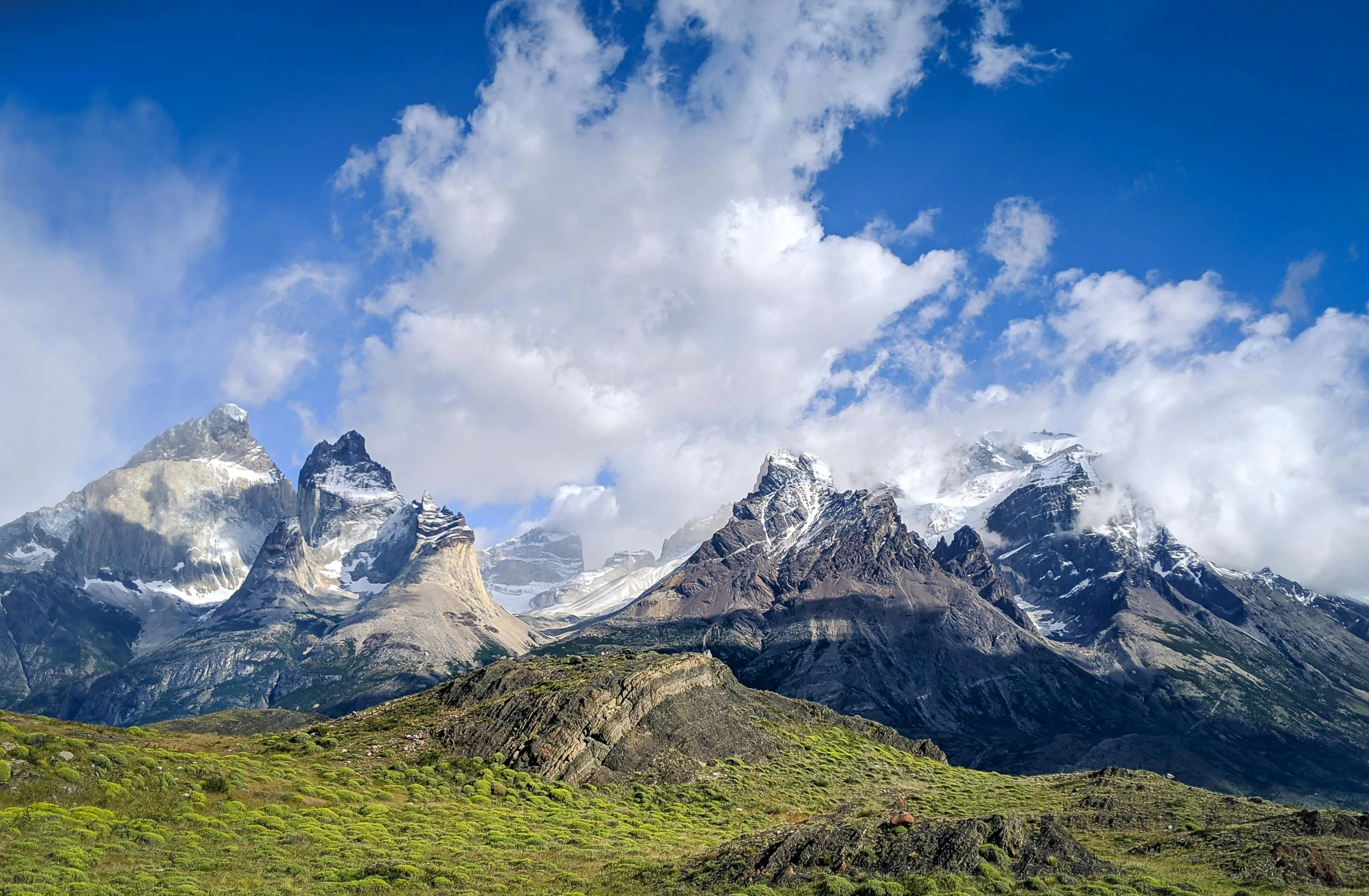 the peaks of mountains are seen in this po