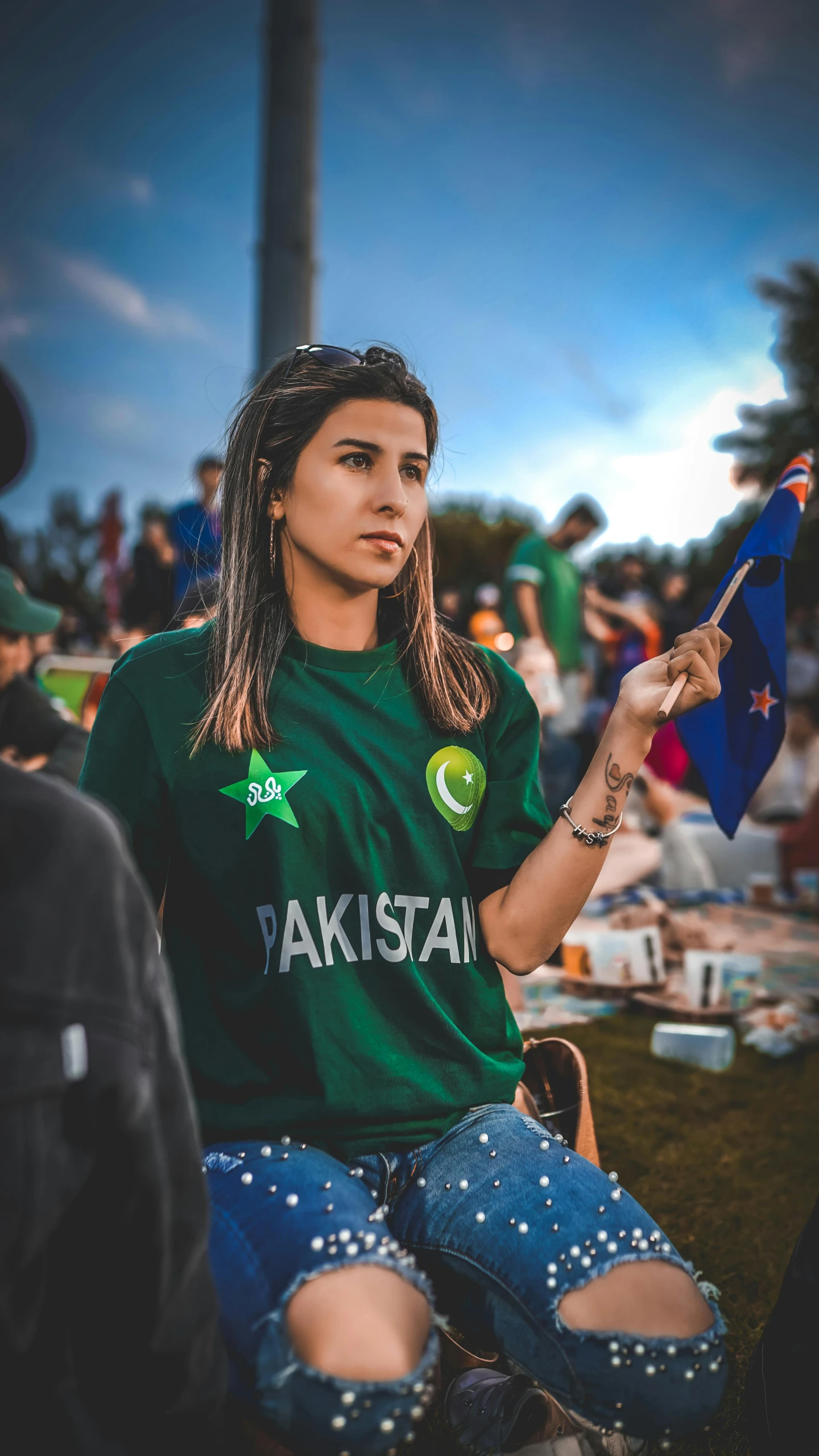 a woman in pakistan holds an american flag