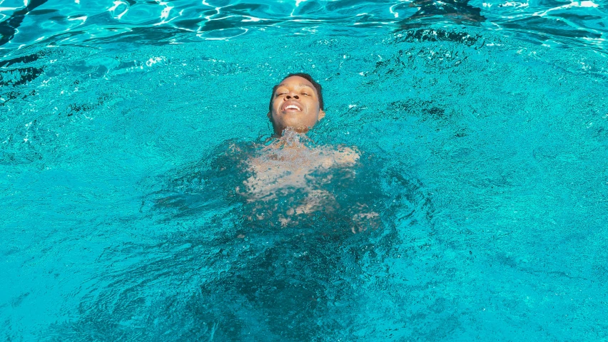 the swimmer is getting ready to go up in the water