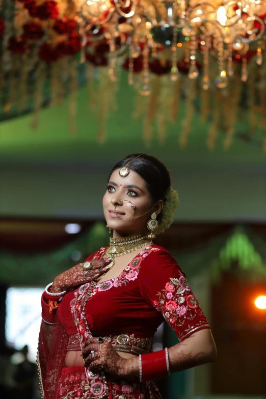 a woman in a red outfit posing for a picture