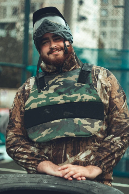 a man with a beard wearing a helmet