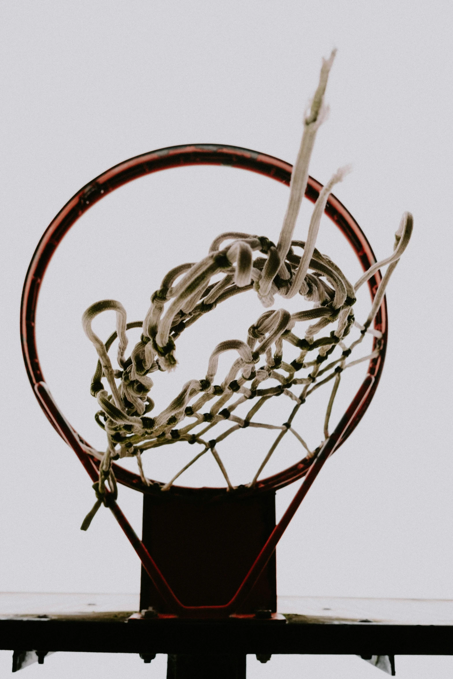 a basket with an object attached is shown