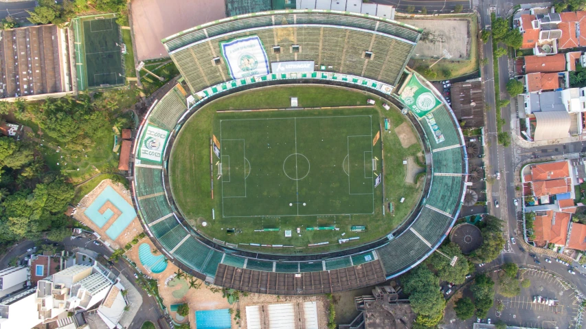 an aerial view of a large stadium with a soccer field