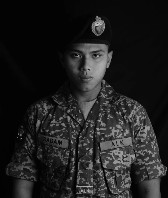 a man in a uniform is posing for a po