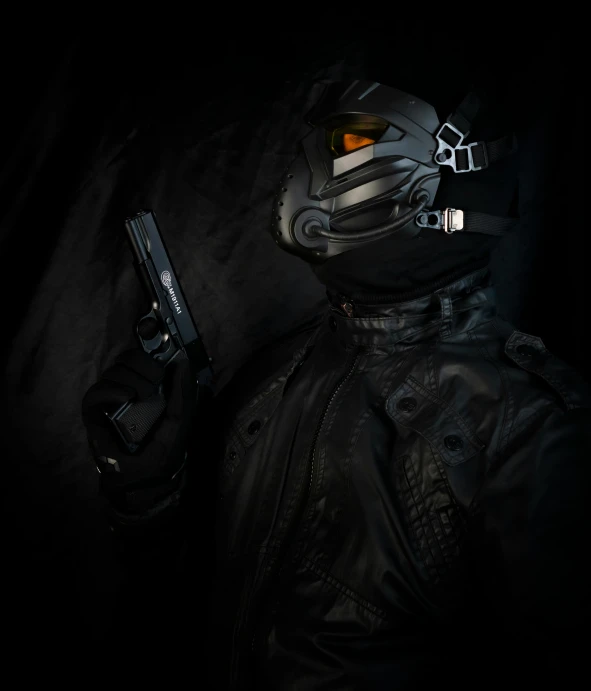 a person holding up a gun and wearing a mask