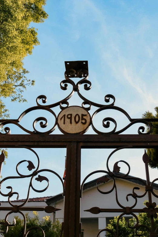 wrought iron gate with 2013 painted on it