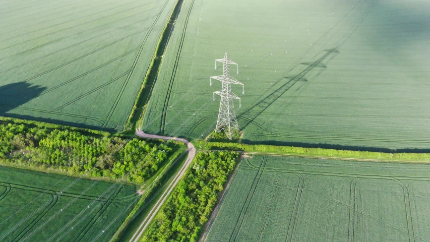 a green field covered in lots of farm land