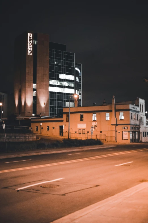 a view of some large buildings lit up at night