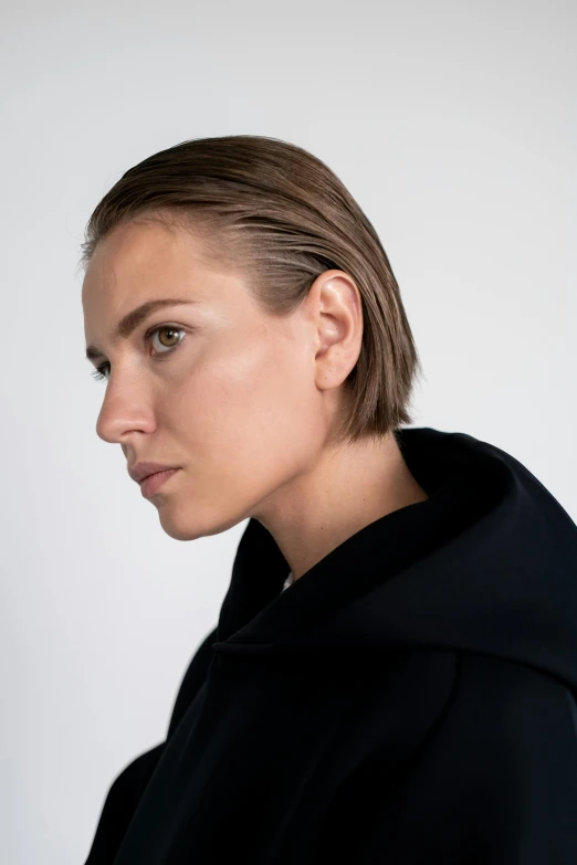 an image of a woman with a messy hairdo