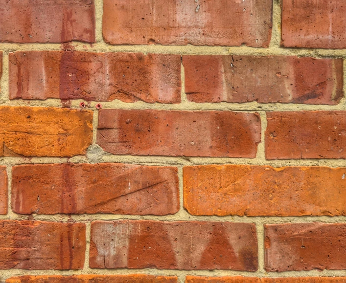 this is a brick wall made from red bricks