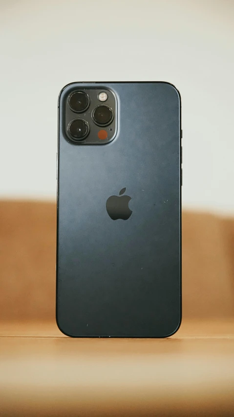 an iphone 11 pro sitting on a table