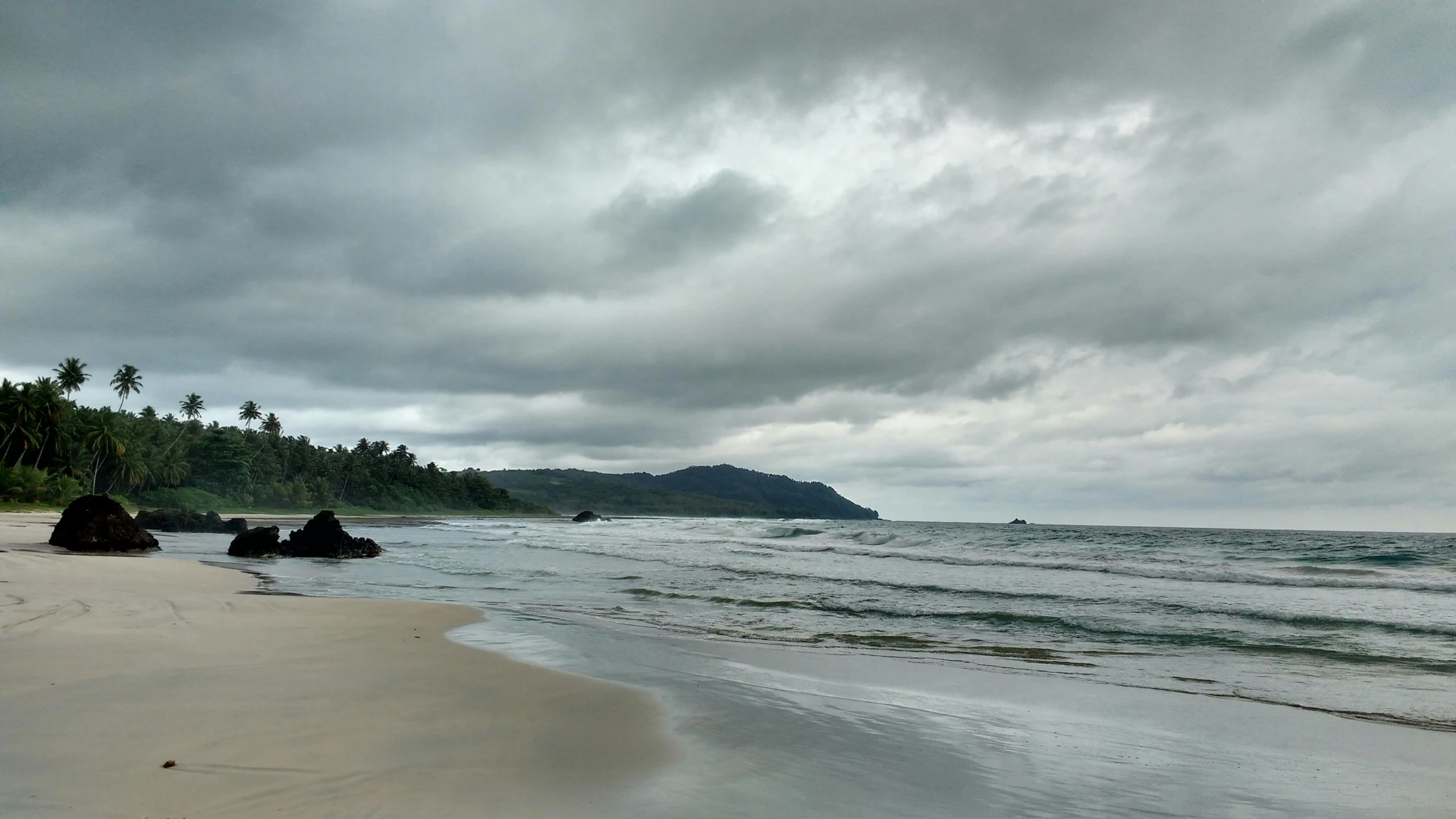 the beach has fallen in to the waves