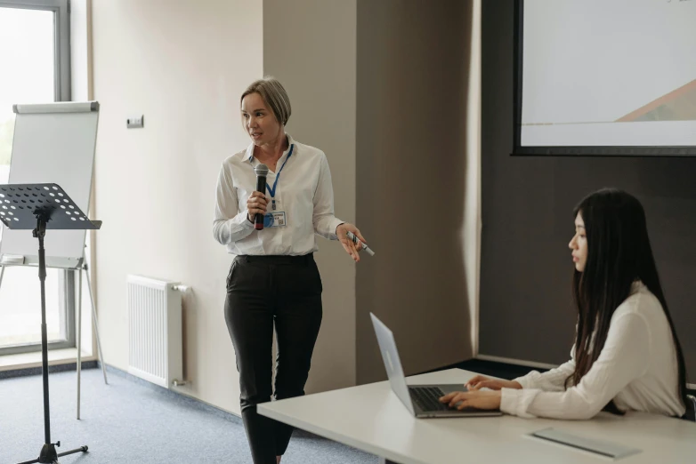 the woman is presenting her business presentation