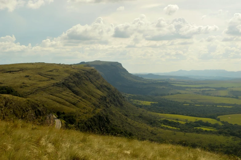 the view from a high cliff looking over the countryside