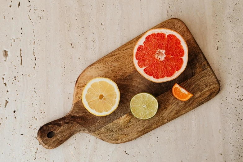 a  board with cut up fruit sitting on top