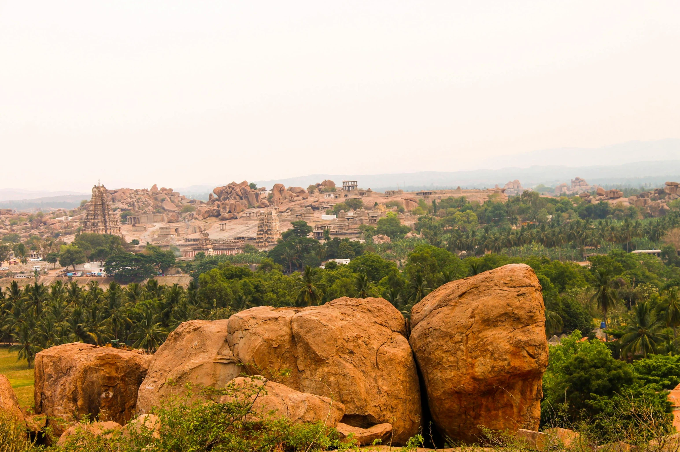 view over a small city from above that includes rocky formations