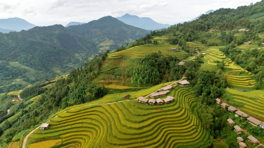 a valley with very steeply sloping grass fields