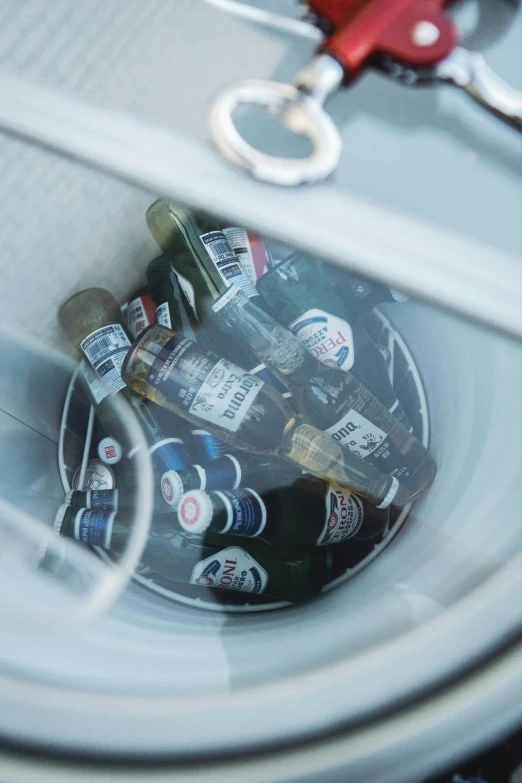 many bottles of beer that are in a glass