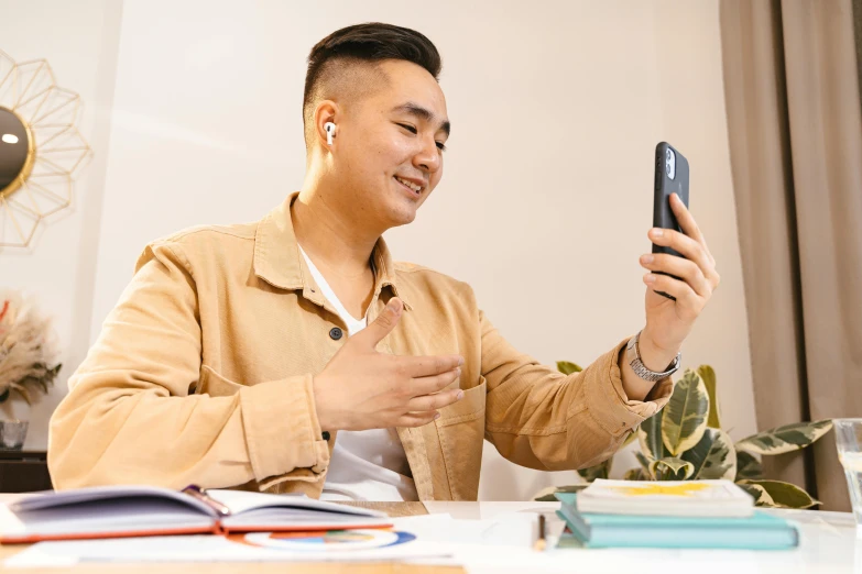 a man taking a selfie with his cell phone