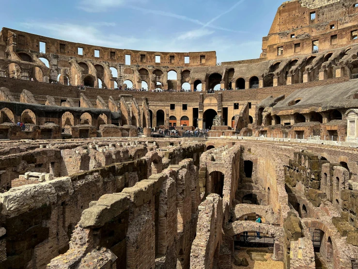 the interior of a large roman arena looking up