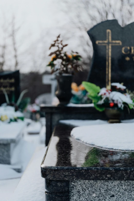 the cemetery features several small crosses, with flowers at each end