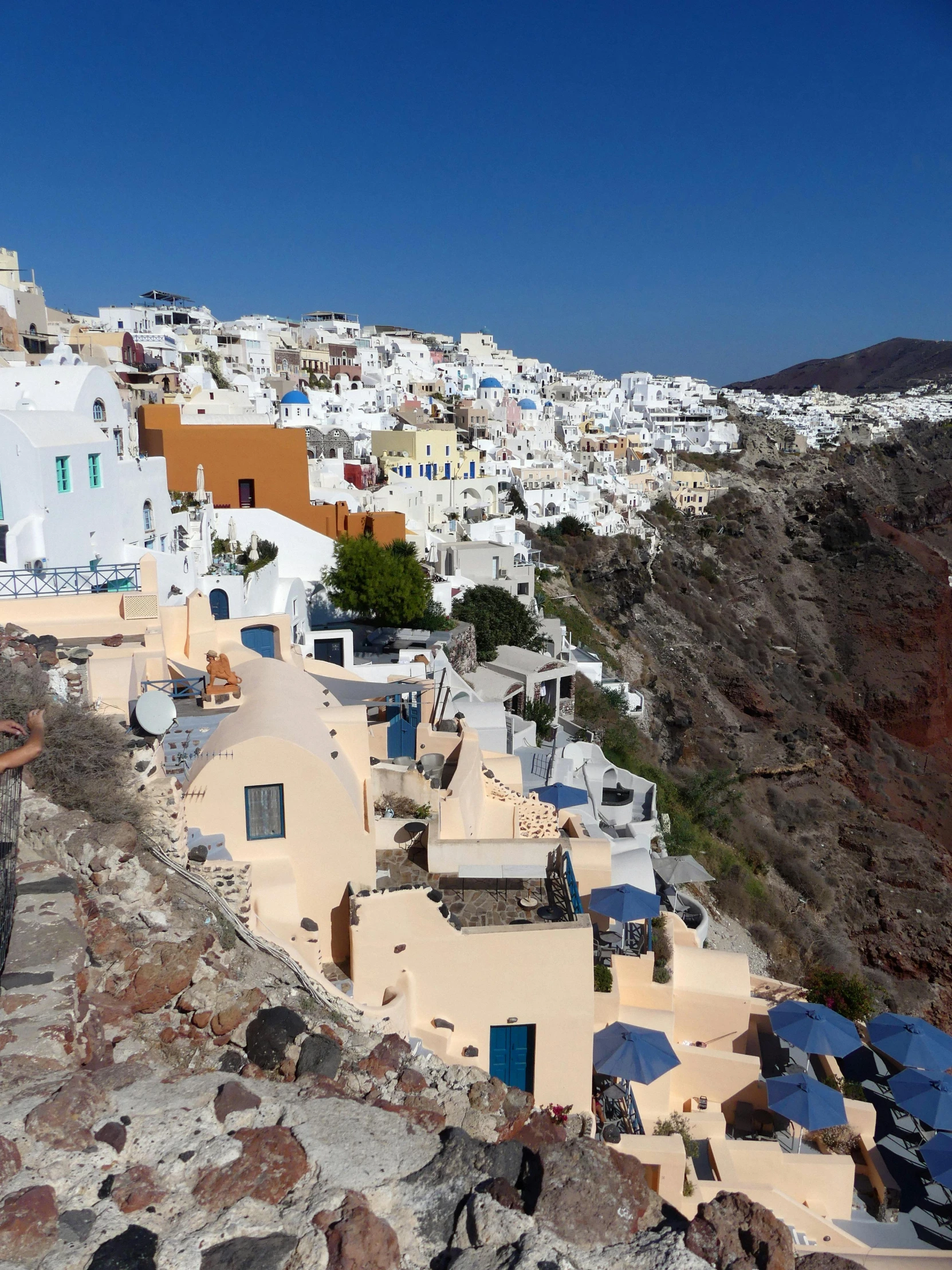 the city with lots of colorful buildings on top of it