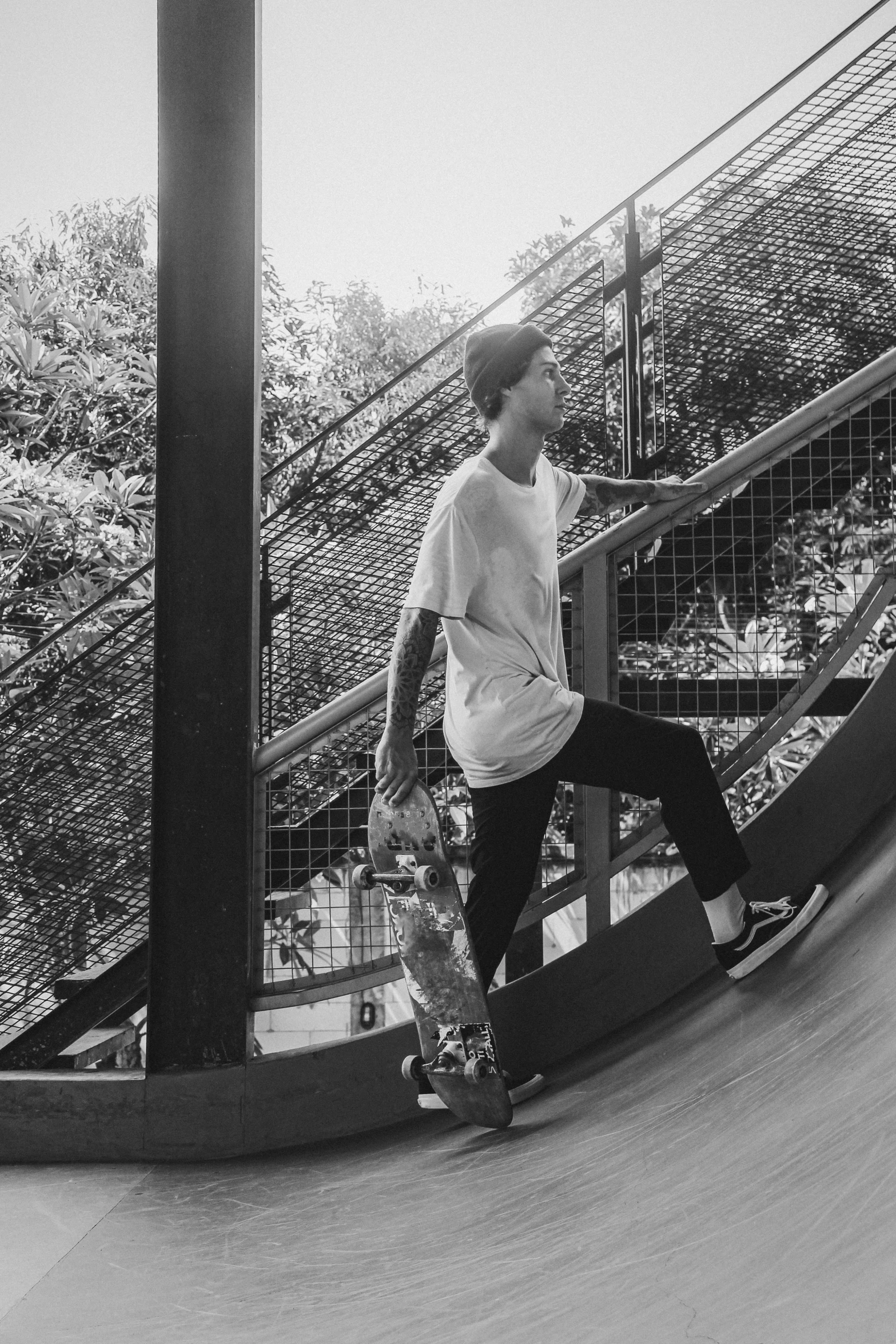 a young skateboarder is going up a ramp