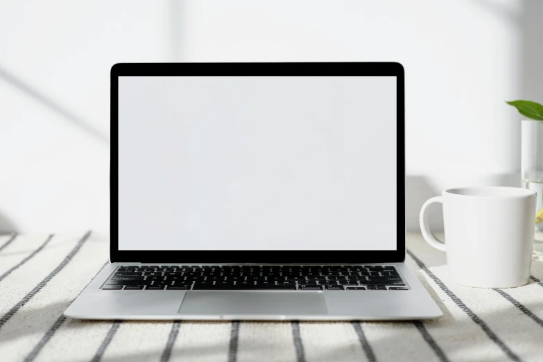 a table with a laptop on top of it