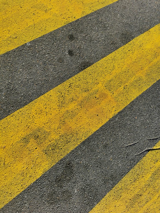 a traffic light sitting above a crosswalk in a city