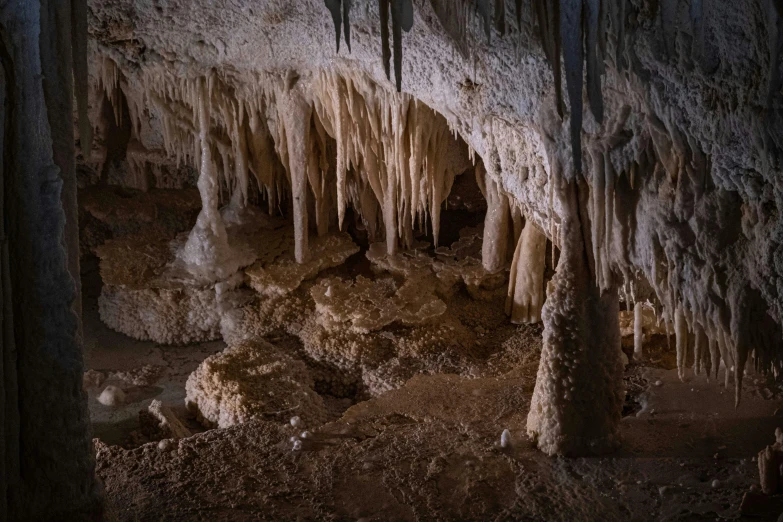 view of formations in an interior cave, showing stalate and columns