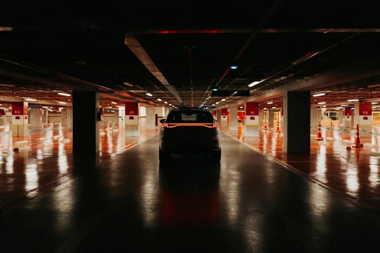 a car parked inside of an underground parking lot