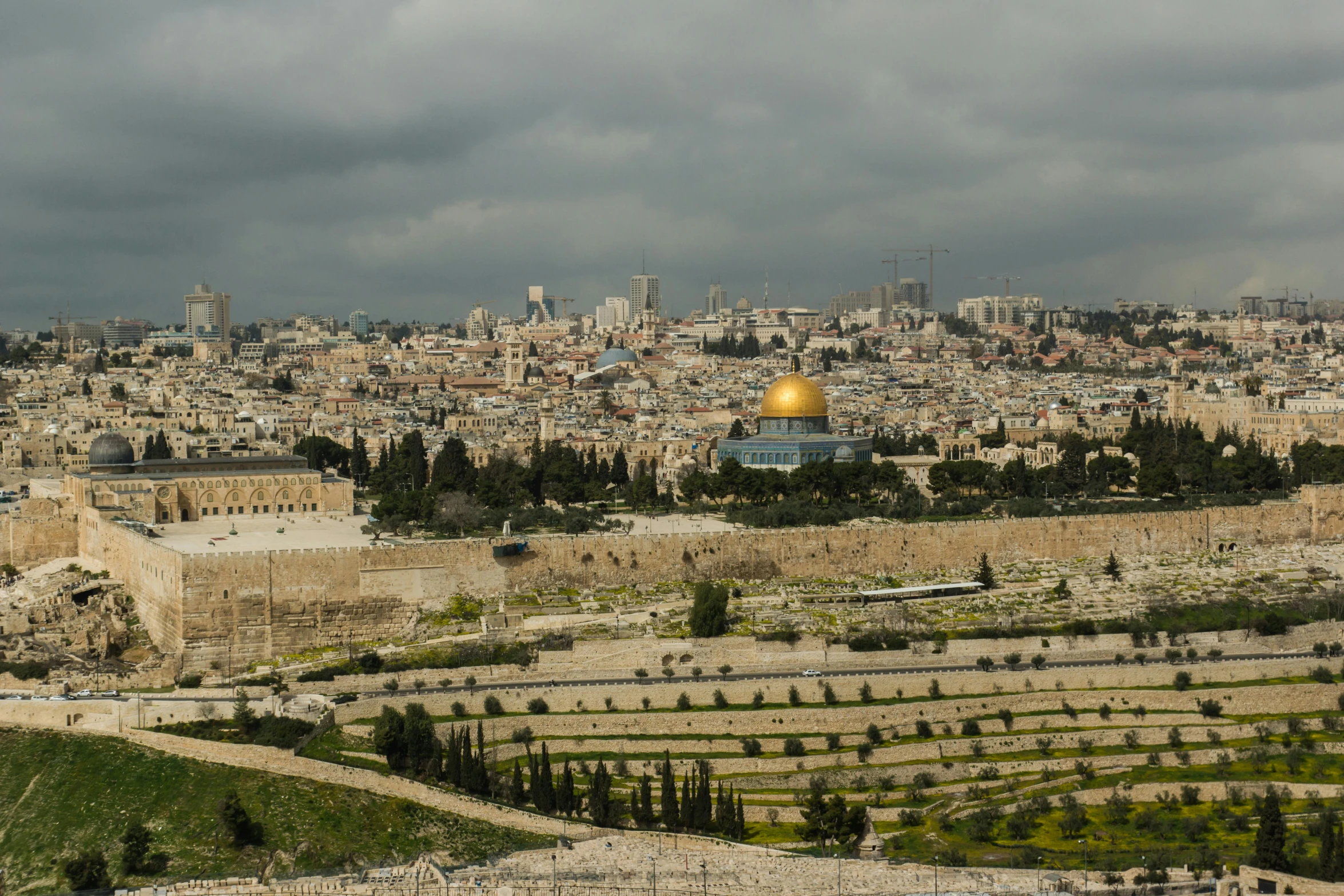 the old city of david and his son on the hill, with the dome in the background