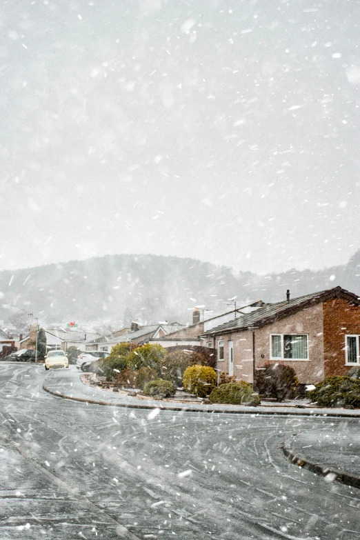 a street scene taken during a snowstorm