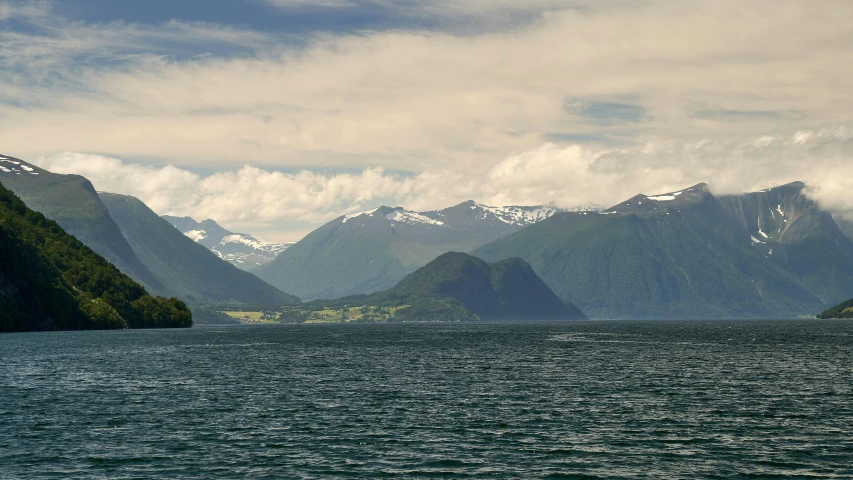 a large body of water surrounded by mountains