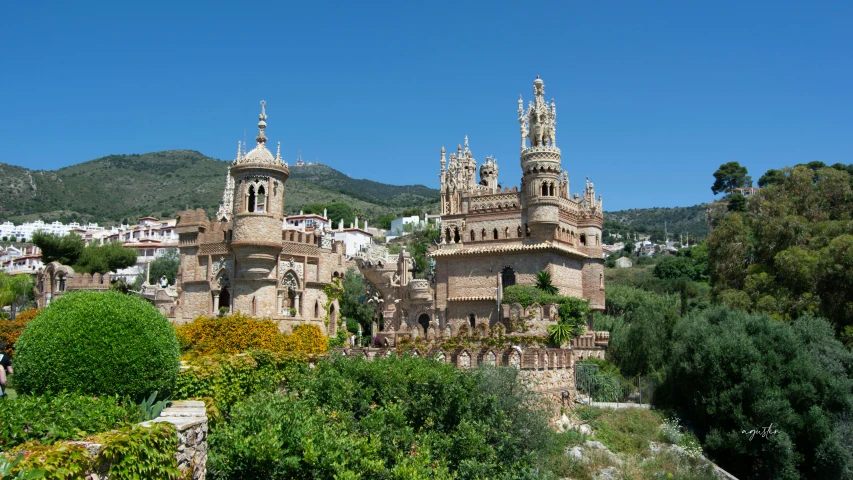 a castle like building is shown in the forest