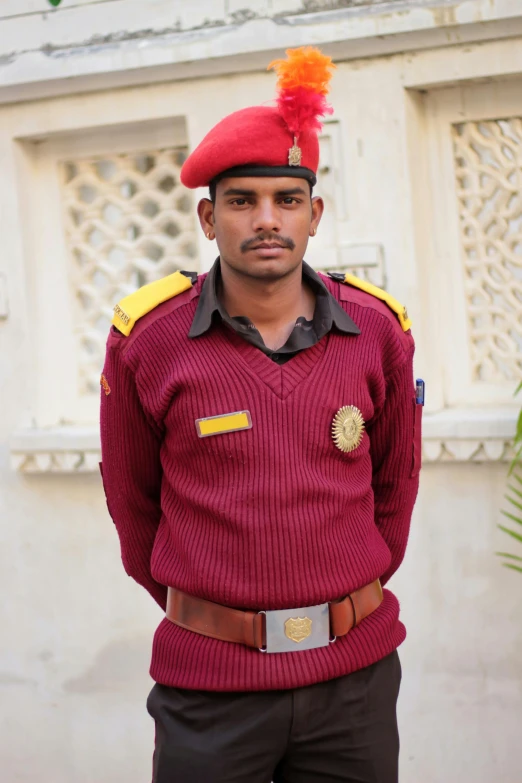 a man is dressed in military clothes for the military parade