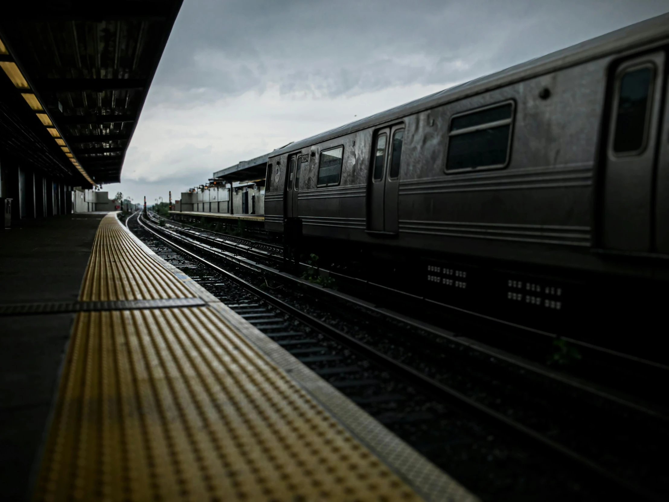 the train is traveling along the railroad tracks