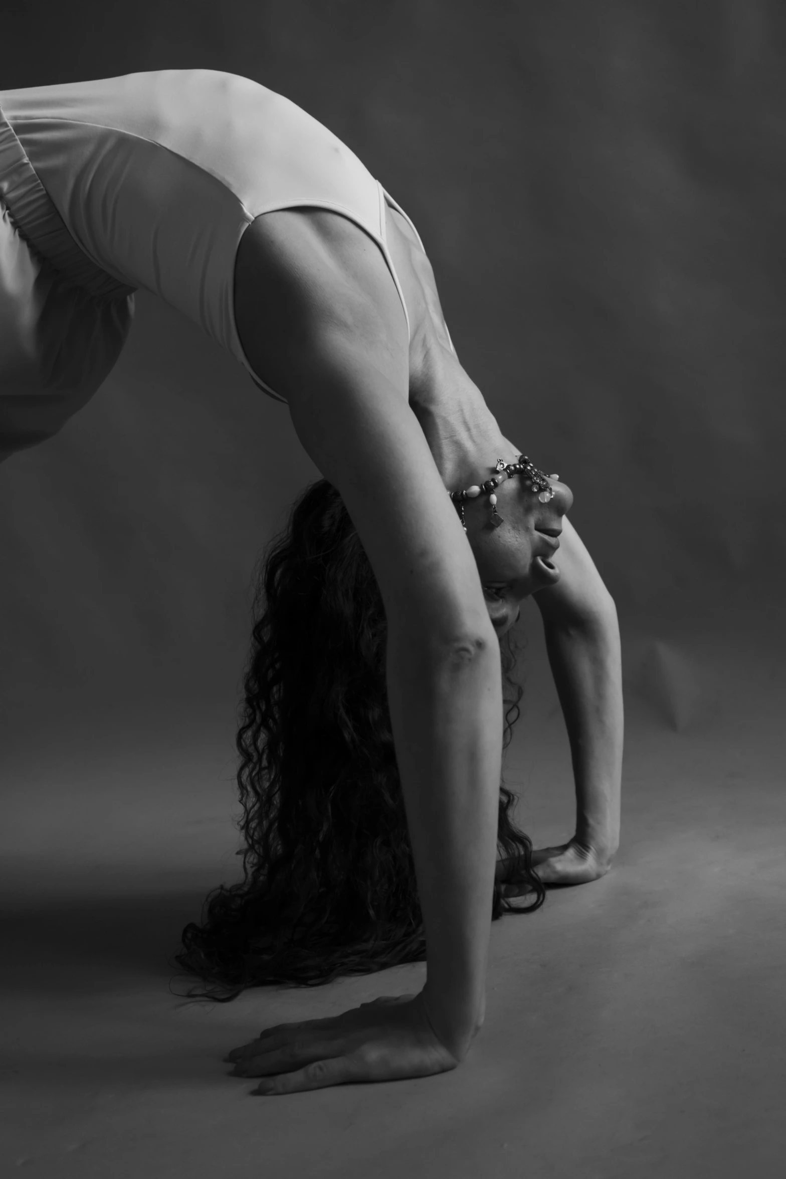 black and white pograph of a woman in a yoga pose