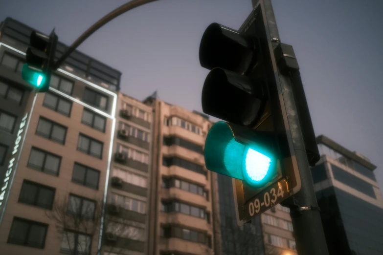 a stop light is green in the dark