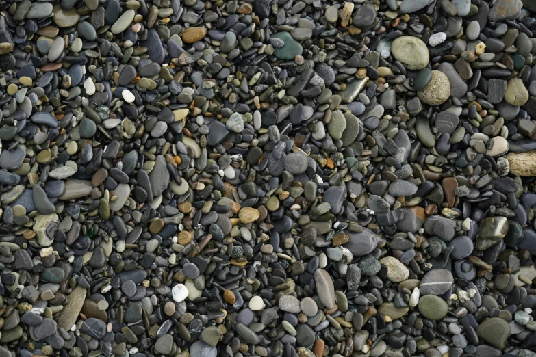 various rocks and gravel are arranged together